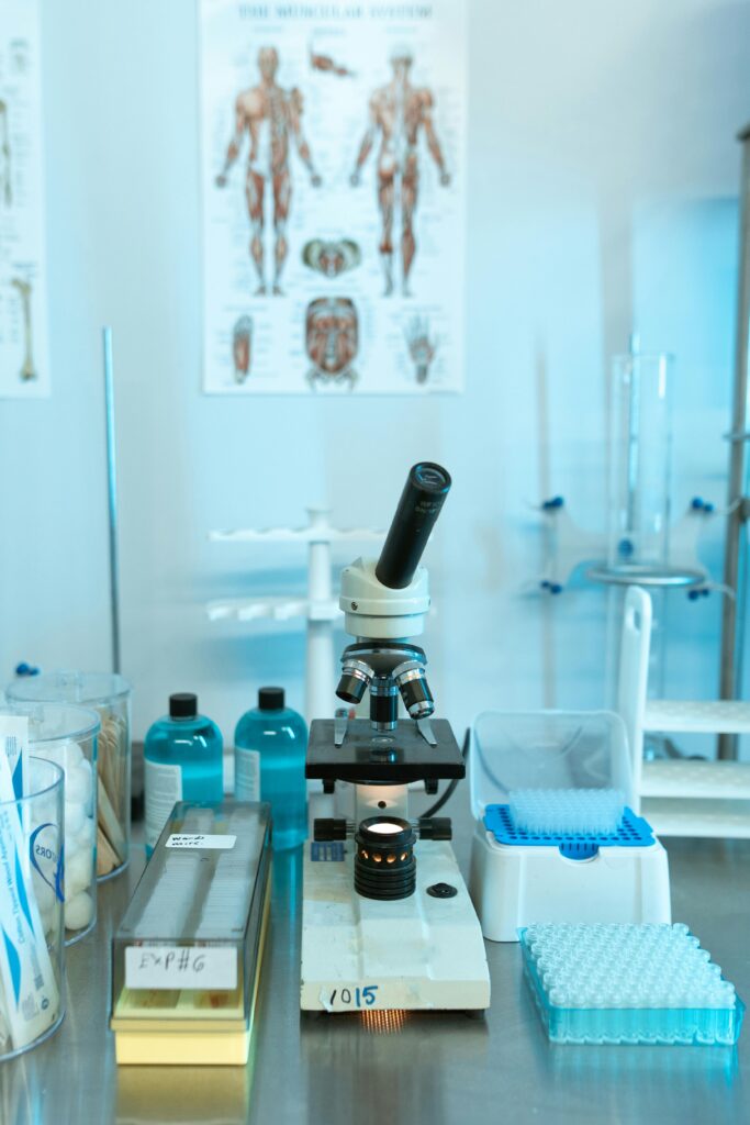 A well-equipped laboratory setup featuring a microscope and other scientific tools.